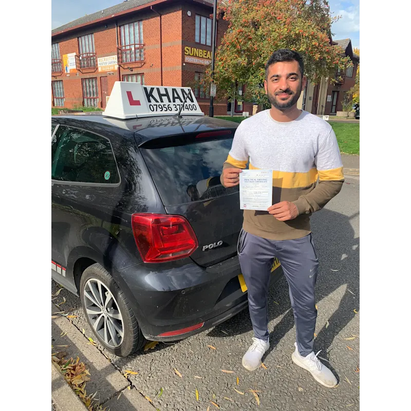 Driving test pass celebration outside local test centre