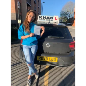 Driving test pass celebration outside local test centre