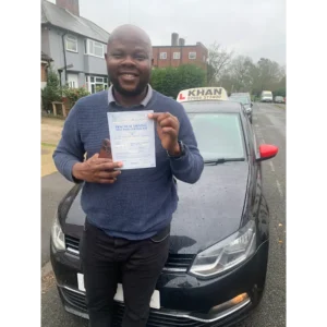 New driver celebrating first time pass after professional driving lessons