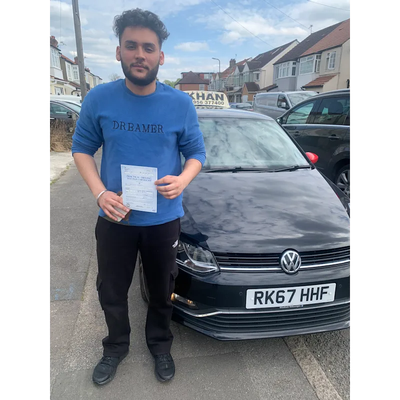 New driver celebrating first time pass after professional driving lessons