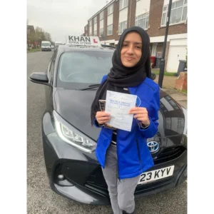 New driver celebrating first time pass after professional driving lessons