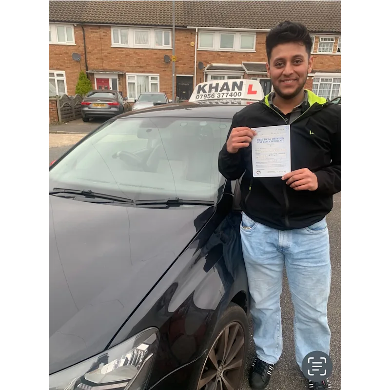 New driver celebrating first time pass after professional driving lessons