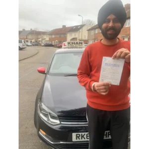 New driver celebrating first time pass after professional driving lessons