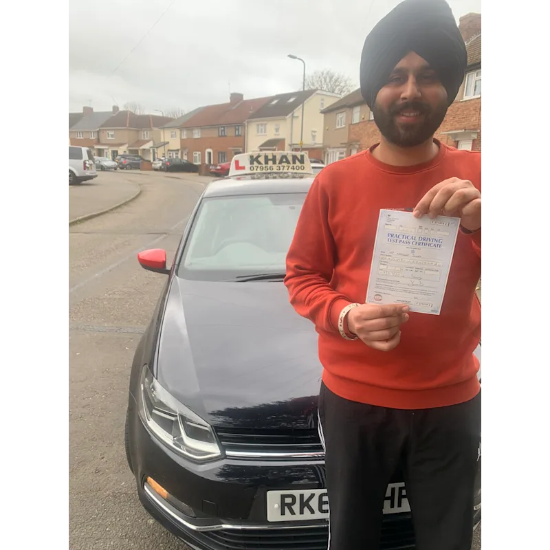 New driver celebrating first time pass after professional driving lessons