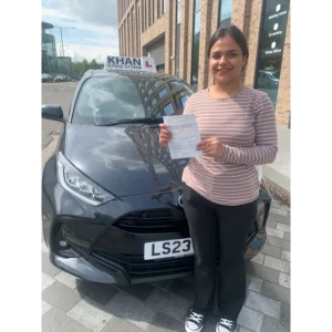 New driver celebrating first time pass after professional driving lessons