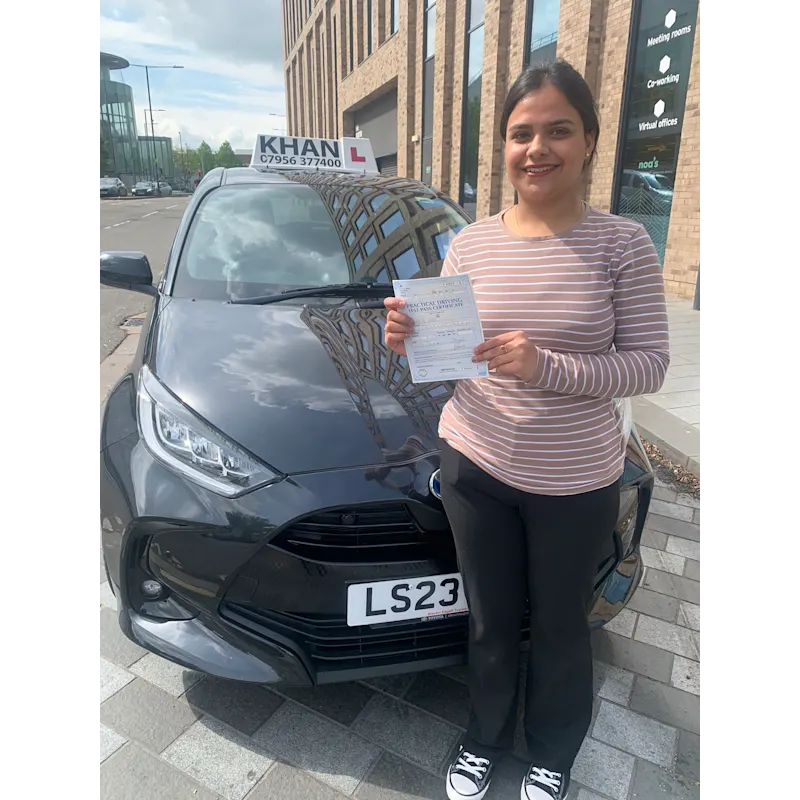 New driver celebrating first time pass after professional driving lessons