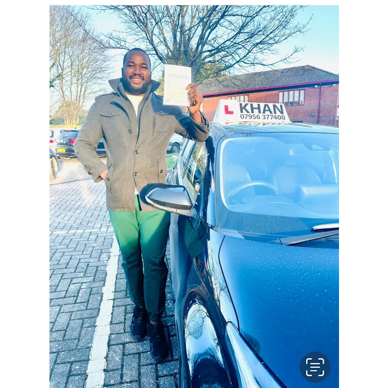 New driver celebrating first time pass after professional driving lessons