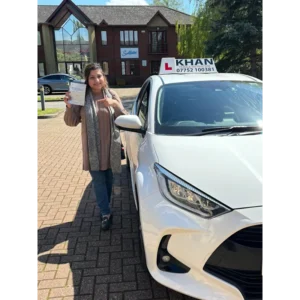 New driver celebrating first time pass after professional driving lessons