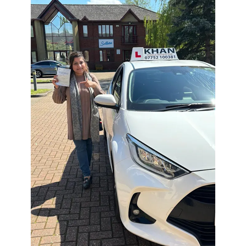 New driver celebrating first time pass after professional driving lessons